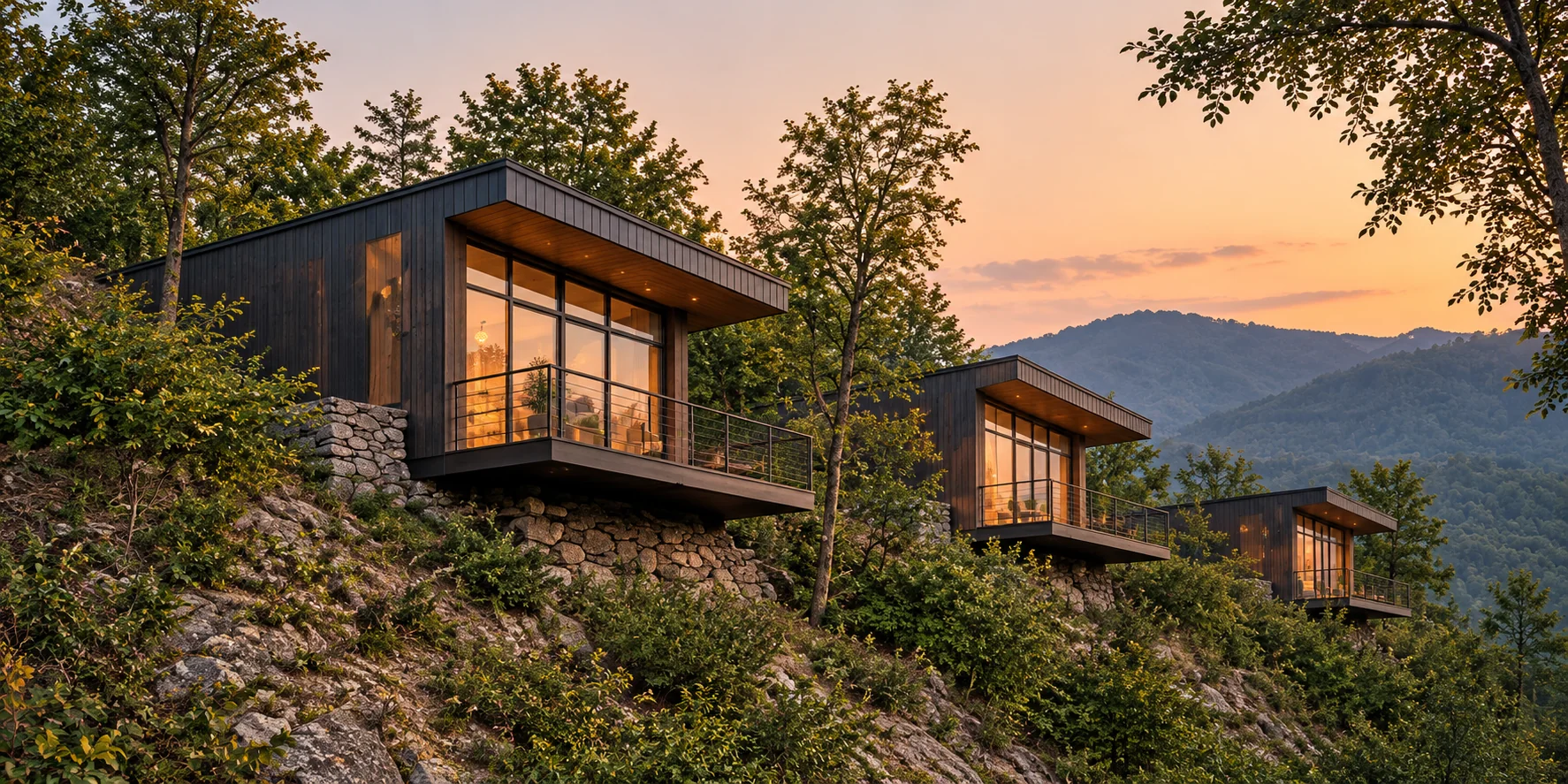 Modern cottages integrated into a wooded hillside
